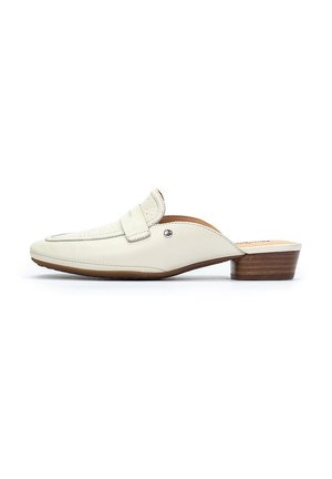 White leather slip-on shoe with a textured front panel, a decorative strap, and a low wooden heel. Smooth finish and rounded toe design.