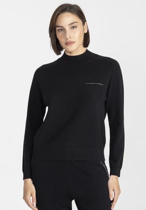 - Sweter