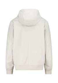 Giacca leggera di colore crema con cappuccio, dal texture liscia, polsini elastici e orlo aderente. Presenta un design minimalista e senza componenti hardware visibili.