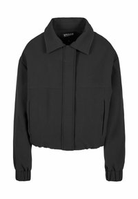 Veste noire courte avec col à revers, fermeture éclair dissimulée à l'avant, poignets élastiques et poches latérales.