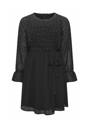 Zwarte jurk met lange doorzichtige mouwen, versierd met kleine studs en een getailleerde taille. Heeft een strikdetail en een uitlopende zoom. Gladde, lichte stof.