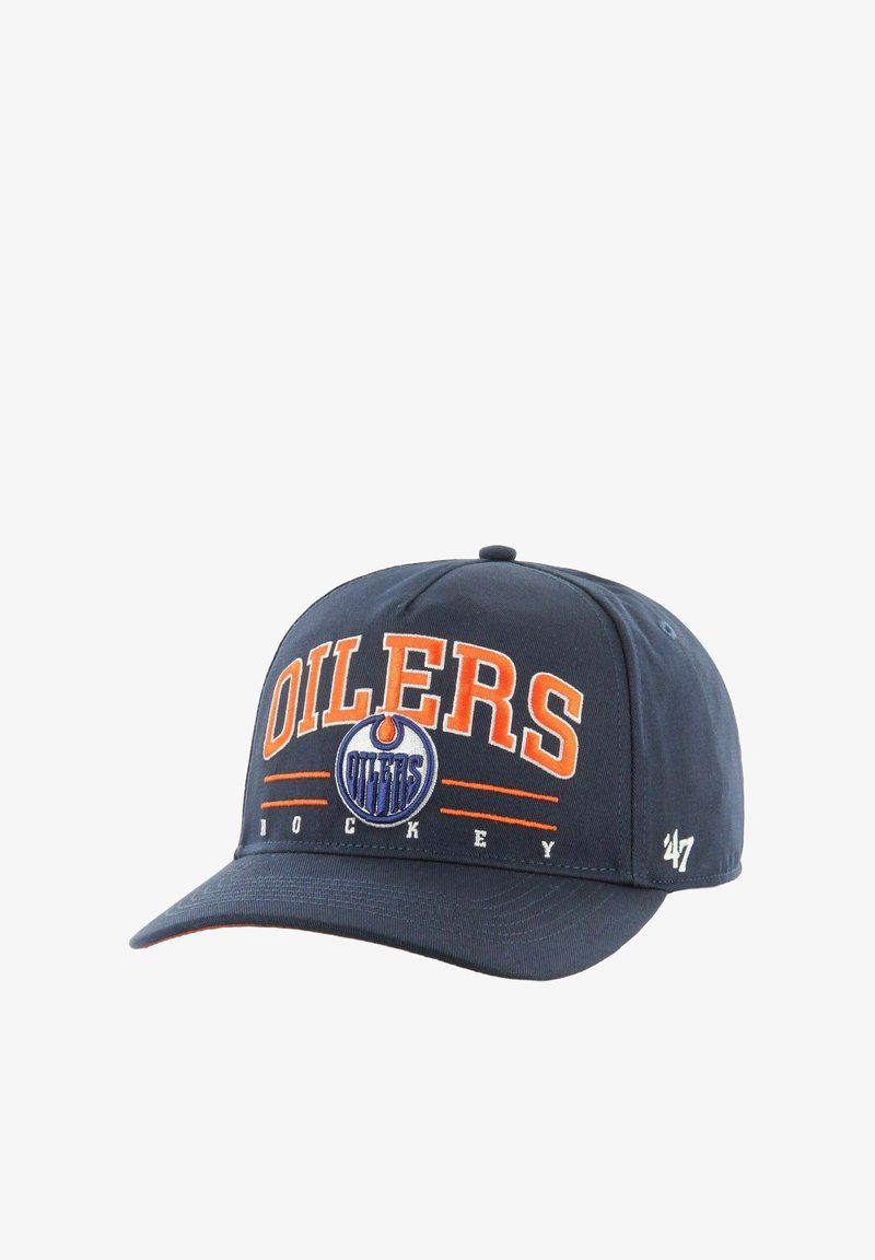 Marineblaues Baseballcap mit „OILERS“ und „HOCKEY“ in Orange bestickt. Verfügt über ein rundes Logo und die Marke '47. Strukturiertes Design mit gebogenem Schirm.