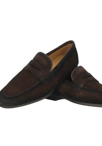 Brown suede loafers with a rounded toe, decorative strap accent, and flat rubber sole. Interior features a smooth, beige lining.