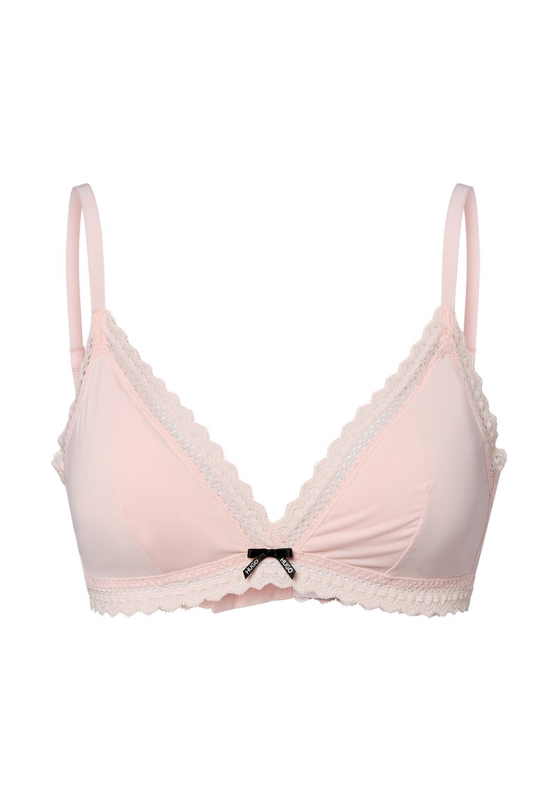 Růžový bralette s krajkovým lemem, v designu ve tvaru V, s nastavitelnými ramínky a malou černou mašlí uprostřed. Hladká textura.