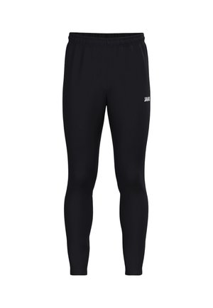 Zwarte nauwsluitende sportleggings met elastische tailleband en klein wit JAKO-logo op de bovenkant van het dijbeen tegen een witte achtergrond.