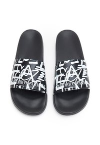 Black slide sandals with a glossy, patterned strap featuring white lettering. Textured footbed and smooth outer surface.