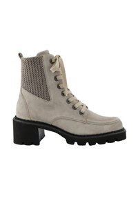 Bottine en suédine beige avec des panneaux en tissu texturé, un laçage à l'avant, un bout rond, et un talon et une semelle en caoutchouc noir épais.