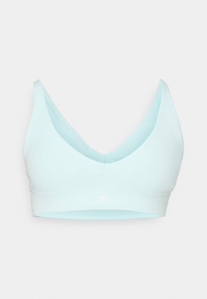 Svetlo modra brezšivna braletka z V-izrezom, izdelana iz mehke tkanine. Ima široko podloženo elastiko in majhen bel logotip spredaj.