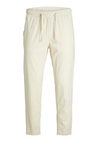 Light beige jogger pants with an elastic waistband and drawstring. Feature a relaxed fit and smooth, soft texture. Ankle-length design.