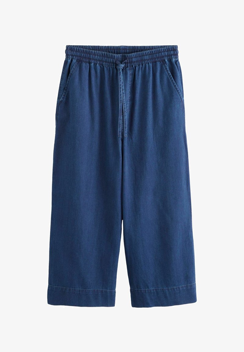 Culottes en denim d'une teinte bleu foncé, avec une taille élastique et un cordon de serrage, ainsi que des poches latérales. Texture lisse et légère.
