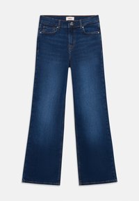 Jeans de perna larga em azul escuro, feitos de denim. Apresentam dois bolsos frontais, dois bolsos traseiros e um fecho de botão com fecho de correr.