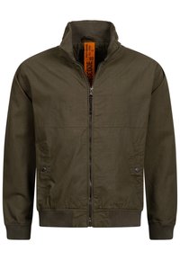 Veste zippée vert olive en tissu mélange de coton. Comprend un col et des poignets côtelés, des poches latérales, et une étiquette orange à l'intérieur.