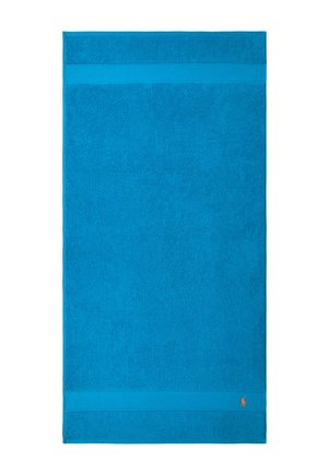 Bright blue rectangular towel with two horizontal bands near edges and a small orange embroidered logo at one corner.