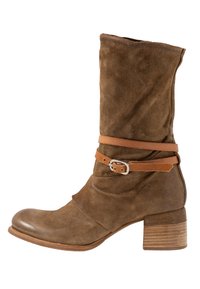 Brown suede ankle boot with a folded design, tan leather strap and silver buckle detail. Round toe and stacked heel feature.