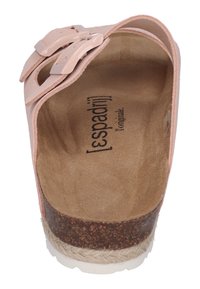 Pink leather slide sandal with two adjustable buckles, cork footbed, and textured outsole. Interior features a soft, suede-like finish.