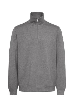 Sudadera gris de tejido suave con cuello alto y media cremallera. Mangas largas y puños y dobladillo de canalé.
