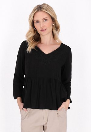 Zwarte blouse met lange mouwen, voorzien van een V-halslijn, een geplooide taille, ingewikkelde borduursels op de borst en een vloeiende ontwerp.
