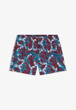 Shorts de bain pour hommes avec un motif floral bleu et rouge, taille élastique avec cordon de serrage, et un petit écusson noir en bas.