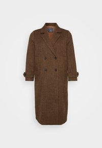Cappotto doppiopetto a scacchi marrone con rever a punta e polsini arrotolati, caratterizzato da un taglio dritto e tessuto testurizzato.