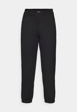 Champion C-TECH CUFFED PANTS INTERLOCK - Donji dijelovi trenirke - black