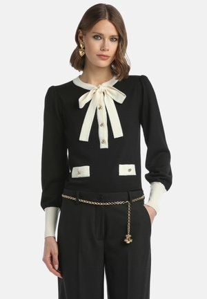 - Sweter