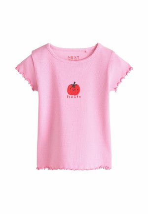 Różowy prążkowany t-shirt dla malucha z krótkim rękawem, ozdobiony falbankami na brzegach oraz grafiką uśmiechniętego czerwonego pomidora z napisem "pomidor" na środku przodu.