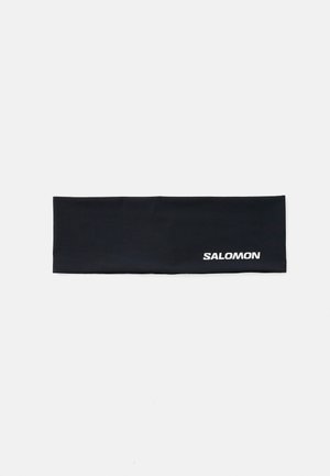 Black headband made of smooth, stretchy fabric; features a white "SALOMON" logo on one side. Rectangular shape, flat design.