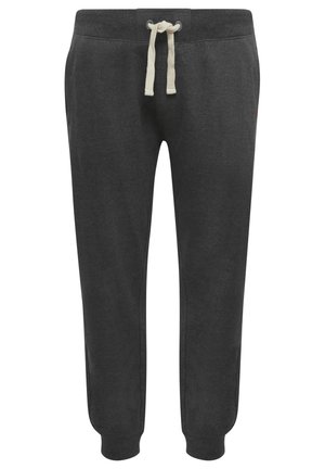 Dark gray sweatpants made of soft material, featuring a drawstring waist with beige ties and tapered cuffs at the ankles.