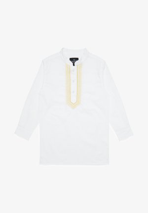 Chemise blanche à manches longues avec un col mandarin, ornée d'un motif brodé jaune décoratif le long de la patte de boutonnage et des poignets.