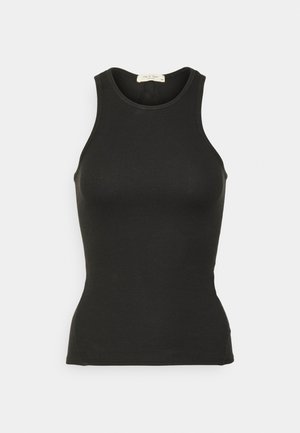 Must mustriga tops, ümar kaelus, kehakujuline ja ilma varrukateta. Pehme tekstuur ja minimaalne disain.