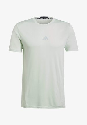 Helle grüne Sport-T-Shirt, kurzärmlig, Rundhalsausschnitt, aus glattem Stoff mit dezentem Logo-Detail auf der Vorderseite und gemustertem Kragen.