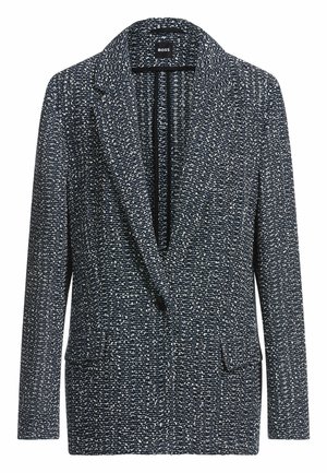 Blazer blu navy realizzato in tessuto testurizzato con fiocchi bianchi. Caratterizzato da un colletto a punte, chiusura con un solo bottone e due tasche anteriori.