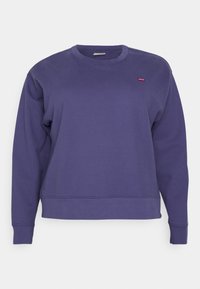 Felpa a maniche lunghe con scollatura rotonda di colore blu scuro, con un piccolo tag logo rosso sul lato sinistro del petto.