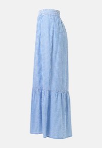 Jupe longue à rayures verticales bleues et blanches avec ourlet froncé et taille élastique, montrée de côté sur un fond uni.