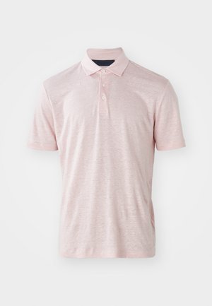 Light pink polo shirt made of soft fabric. Features a classic collar and three-button placket. Short sleeves and a relaxed fit.