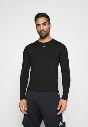 TECHFIT TEE - Aluspaita - black