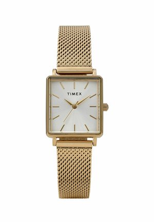 Guld mesh armbåndsur med firkantet urkasse, hvid tekstureret urskive, guld timemarkører og et minimalistisk design. Mærkenavn: Timex.