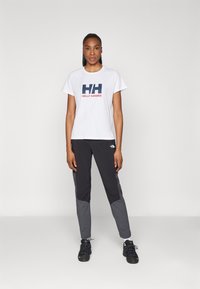 Helly Hansen HH LOGO
 - Triko s potiskem - white