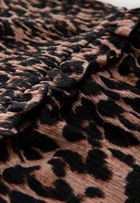 Next Overall / Jumpsuit - animal print