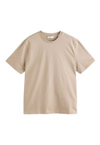T-shirt beige à manches courtes et col rond avec un design simple et uni, et une petite étiquette à l'intérieur du col.