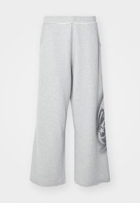 TRIBAL AIRBRUSH STAR JOGGER UNISEX - Tepláky - grey tribal