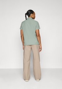 Peak Performance CARGO PANTS - Hlače za otvoreno - avid beige