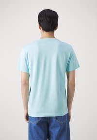Calvin Klein Jeans EMBRO BADGE - Základné tričko - blue tint
