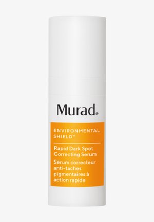 Sérum correcteur rapide des taches foncées Murad Environmental Shield dans un flacon pompe blanc avec une étiquette orange et un texte noir.