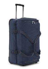 Borsa da viaggio con ruote di colore blu navy, realizzata in un tessuto esterno resistente, con spallacci regolabili e scomparti con zip. Dotata di manico estensibile e ruote.
