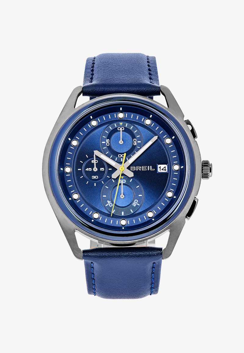 Montre analogique bleue avec boîtier en acier inoxydable, bracelet en cuir bleu, cadran rond, aiguilles argentées, sous-cadrans et affichage de la date.