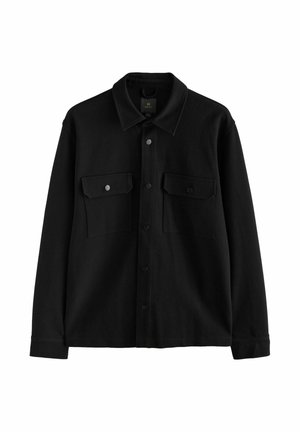 Black long-sleeve button-up shirt jacket with two front flap pockets and a pointed collar, displayed on a white background.