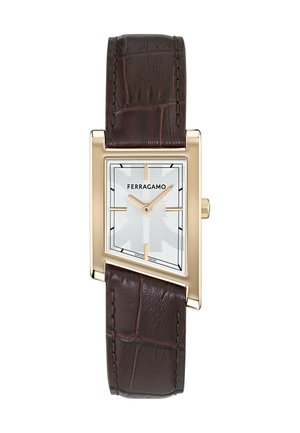 Ristkülikukujuline kuldse tooniga Ferragamo käekell hõbedase sihverplaadi, minimalistlike kuldsete tunnimärkide ja tumepruuni krokodillinahast rihmaga.