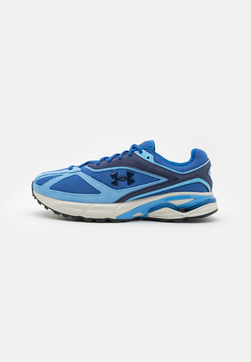 Blue athletic shoe with mesh and synthetic upper, featuring a dark blue accent, cushioned sole, and black rubber traction outsole.