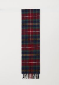 Sciarpa a quadri intrecciata in rosso, verde e blu navy con accenti gialli. Presenta estremità frangiate e un tessuto morbido e testurizzato.